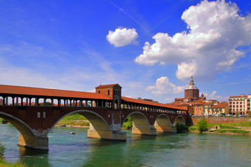 Fototapeta na wymiar cityscape of pavia with the old bridge and river in italy