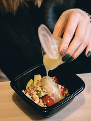 Quinoa Salad with pepper, avocado, nuts and mango sauce