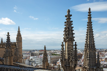 Fototapeta na wymiar Seville cathedral decorations close view from the cathedral roof