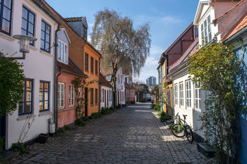 Fototapeta na wymiar Colourful houses on Møllestien Lane in Aarhus, Denmark