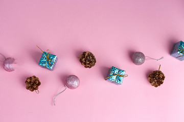 Christmas decorations on pink background