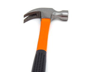 A claw hammer with black and orange handle, isolated over white background. Tools and hardware for everyday. Construction and repair. Selective focus. Copy space