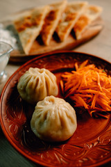 Mongolian traditional food on wood desk