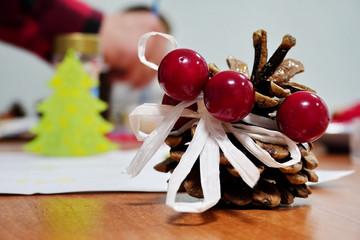 Christmas tree decorations on the blured background of a group of people. children's matinees and holidays for adults at Christmas time.