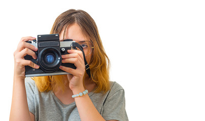 young girl takes pictures with a rare camera