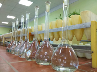 laboratory flasks with liquid solutions