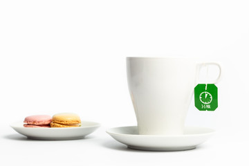 cup of tea with macaroons