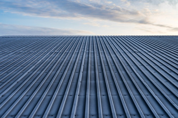 Morning winter frost on the roof of metal.