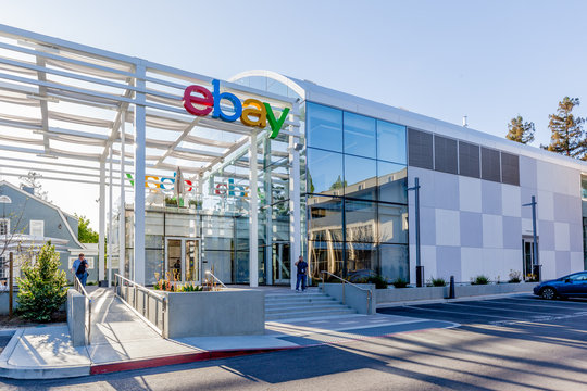 San Jose, California, USA - March 29, 2018: eBay sign at eBay 's headquarters in San Jose, California. eBay Inc. is a multinational e-commerce corporation.