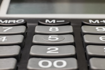 Fototapeta premium Numbers on calculator buttons close up