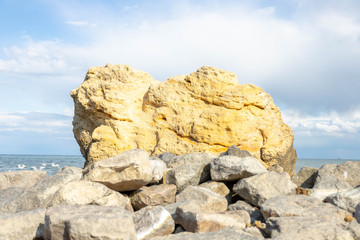 Beautiful large stones by the sea or ocean