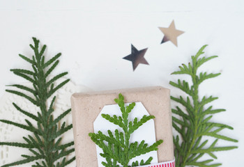 Christmas composition of spruce branches and stars
