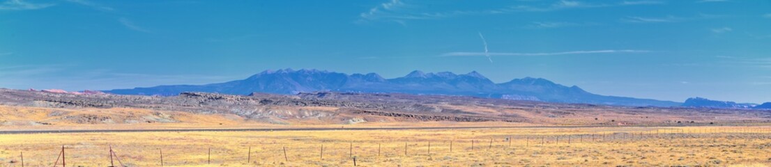 Moab Panorama views of desert mountain ranges along Highway 191 in Utah between Moab and Price in fall. Scenic nature near Canyonlands and Arches  National Park. United States of America. USA.