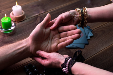 Witch - fortune teller reading fortune close up