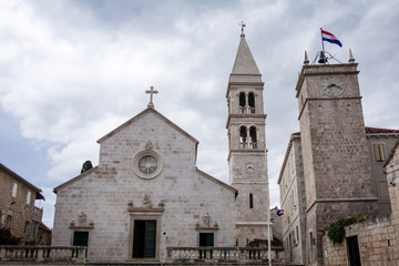 Supetar, Croatia / June 27th 2018: Church of Saint Peter, sveti Petar in old town Supetar, Brac Island. Croatia, Europe