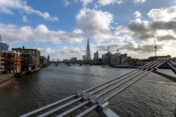 Fototapeta premium View of the south bank of river Thames with the Millennium Bridge in the foreground