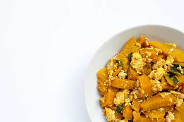 Stir-fried pumpkin with eggs on white