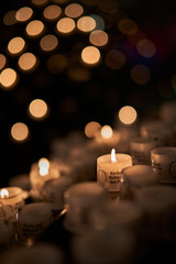 Candles in a church in remembrance of deceased individuals