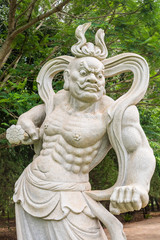 Obraz premium Foz do Iguacu, Brazil - Circa October 2019: Guardian statue at Chen Tien Buddhist Temple