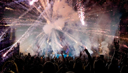 Fototapeta na wymiar crowd and fireworks celebrating new year