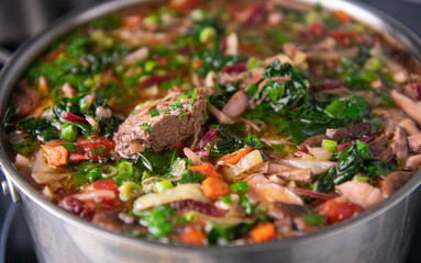Close up of Home Made Borscht Soup Being Cooked in Stainless Steel Pot