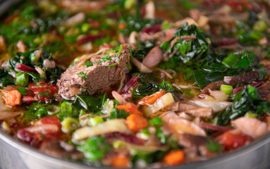 Close up of Home Made Borscht Soup Being Cooked in Stainless Steel Pot
