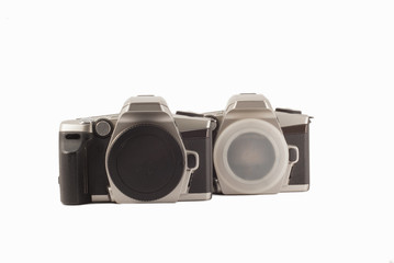 35 mm analog camera on a white background. Film camera.