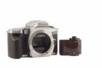 35 mm analog camera on a white background. Film camera.