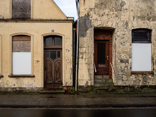 Fototapeta na wymiar Norden, Germany. 8 December 2019. Derelict working class homes.