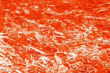 Bright orange lush lava background. Water pattern, abstract background