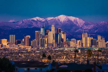Fotobehang FEBRUARY 6, 2019 - LOS ANGELES, CA, USA - "City of Angeles" - Los Angeles Skyline framed by San Bernadino Mountains and Mount Baldy with fresh snow from Kenneth Hahn State Park © spiritofamerica