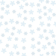 Blue snowflakes on a white background. Seamless background for Christmas design.