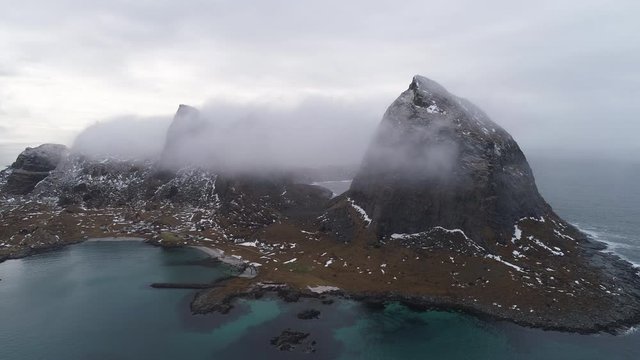 Mountains of Sanna island end of winter, Nordland, Northern Norway, aerial drone shot