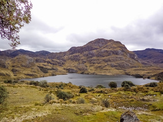 Cloudy day at Cajas National Park, view of the lagoon and mountains at the entrance