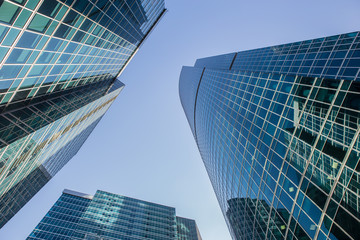 Obraz na płótnie Canvas futuristic skyscrapers with glass facades