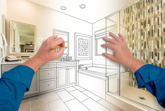 Male Hands Sketching Beautiful Custom Bathroom Gradating to Finished Construction