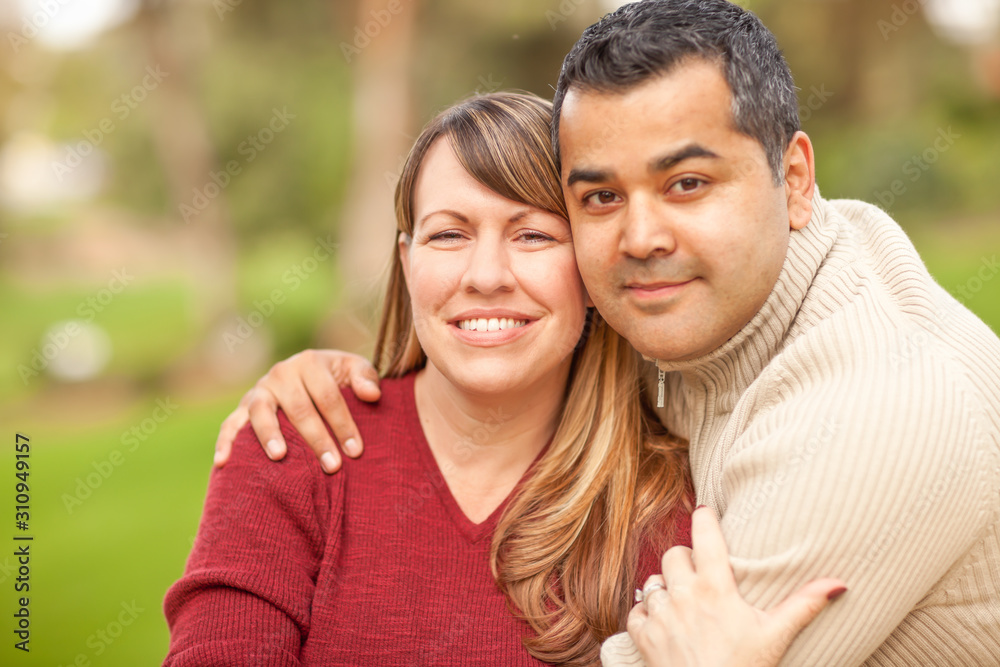 Wall mural Attractive Mixed Race Couple Portrait in the Park