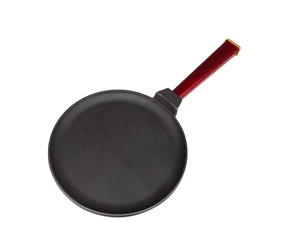 Cast iron frying pan on white isolated background.