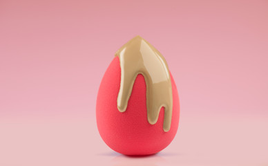 Makeup liquid foundation pouring on pink make-up blender sponge, closeup. Applying Foundation...