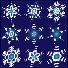 Collection of simple snowflakes on blue background.