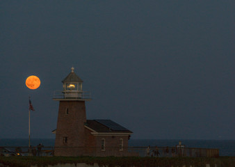 Moonrise over lighthouse in Santa cruz