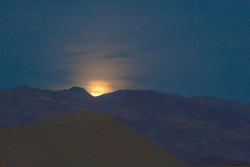 Fototapeta na wymiar Moonrise over death valley national park, California