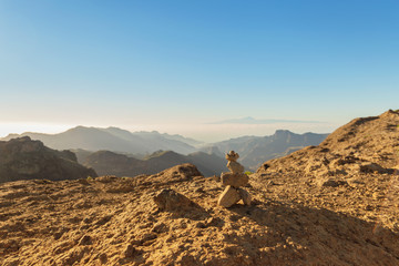 Rock stacking and view of Roque Nublo, Gran Canaria in the Canary Islands	