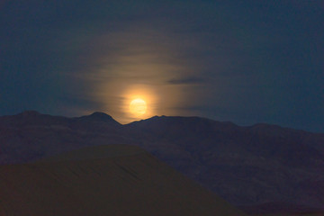 Fototapeta na wymiar Moonrise over death valley national park, California