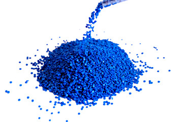 Close-up of plastic polymer granules. hand hold Polymer pellets. polymer plastic. compound polymer.