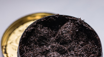 smokeless tobacco in a can close up