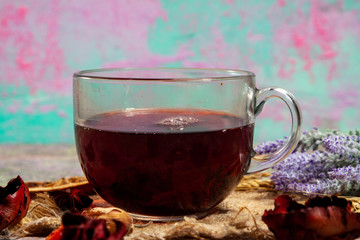 Red Hot Hibiscus tea in a glass mug