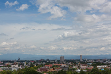 Obraz premium white cloud on blue sky above the town, aerial view cityscape