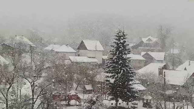 It's snowing in a rural area in Transylvania - Romania
