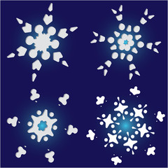 Fototapeta na wymiar Set of christmas paper snowflakes on blue background.